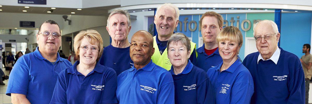 Group of people in their volunteer uniforms.