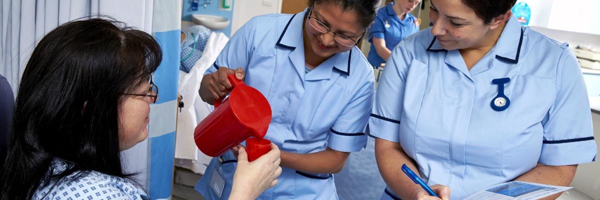 Image of staff member in training on a ward